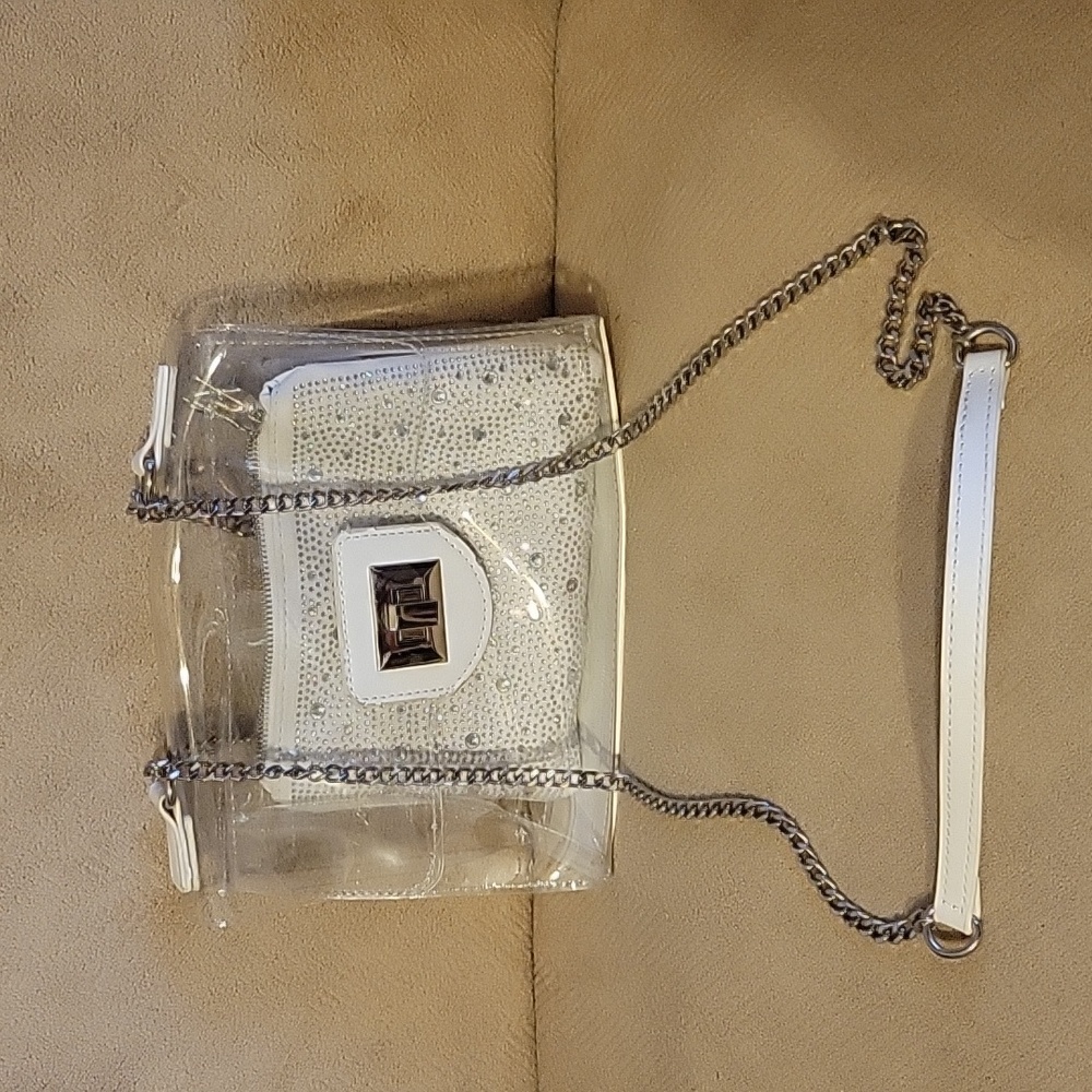 Steve Madden Clear concert/stadium bag with sparkle pouch.